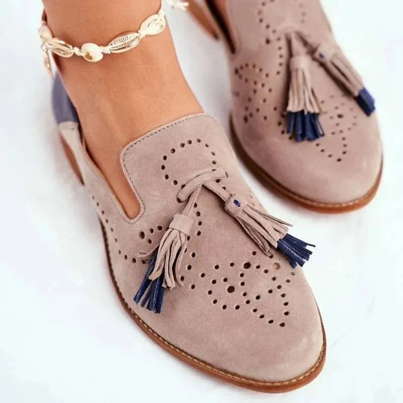 Two-tone slip-on shoes with tassels