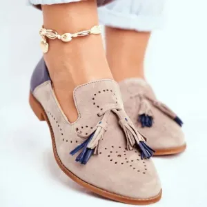 Two-tone slip-on shoes with tassels