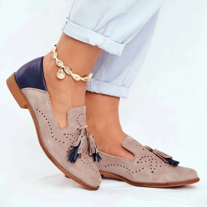 Two-tone slip-on shoes with tassels