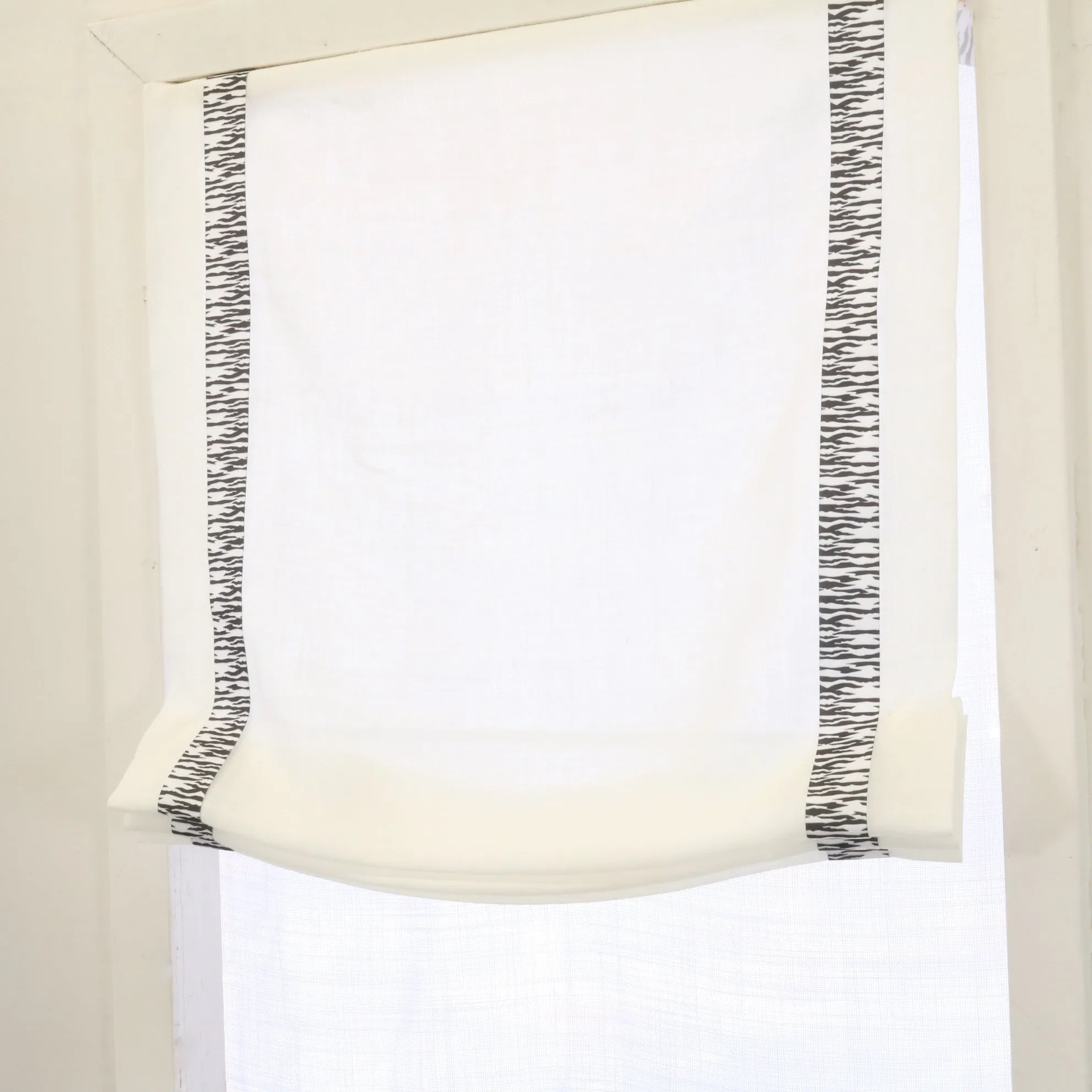 White Linen Relaxed Roman Shade with Animal Print Ribbon